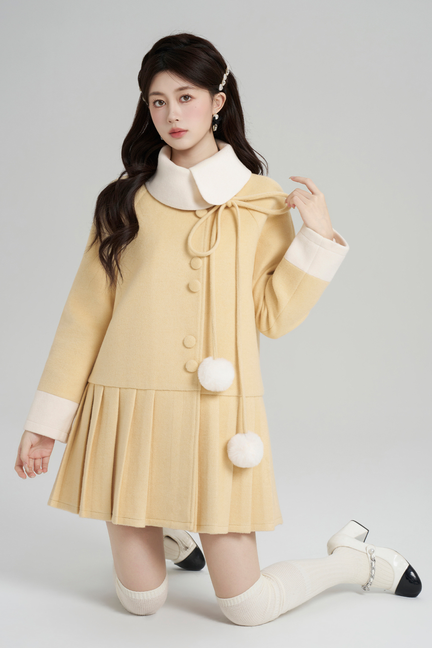 イエロープリーツウールコート