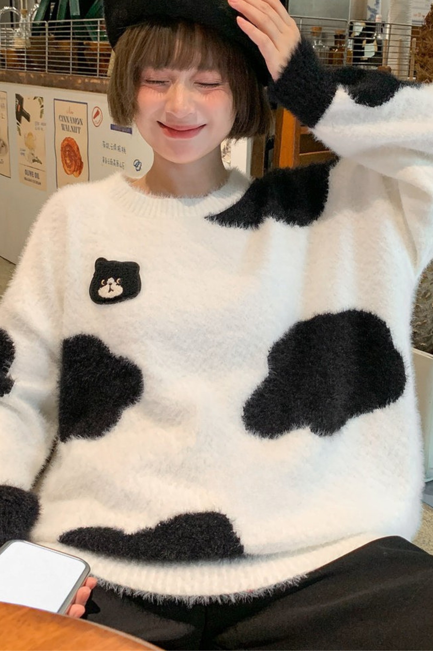 モノクロルーズニットセーター