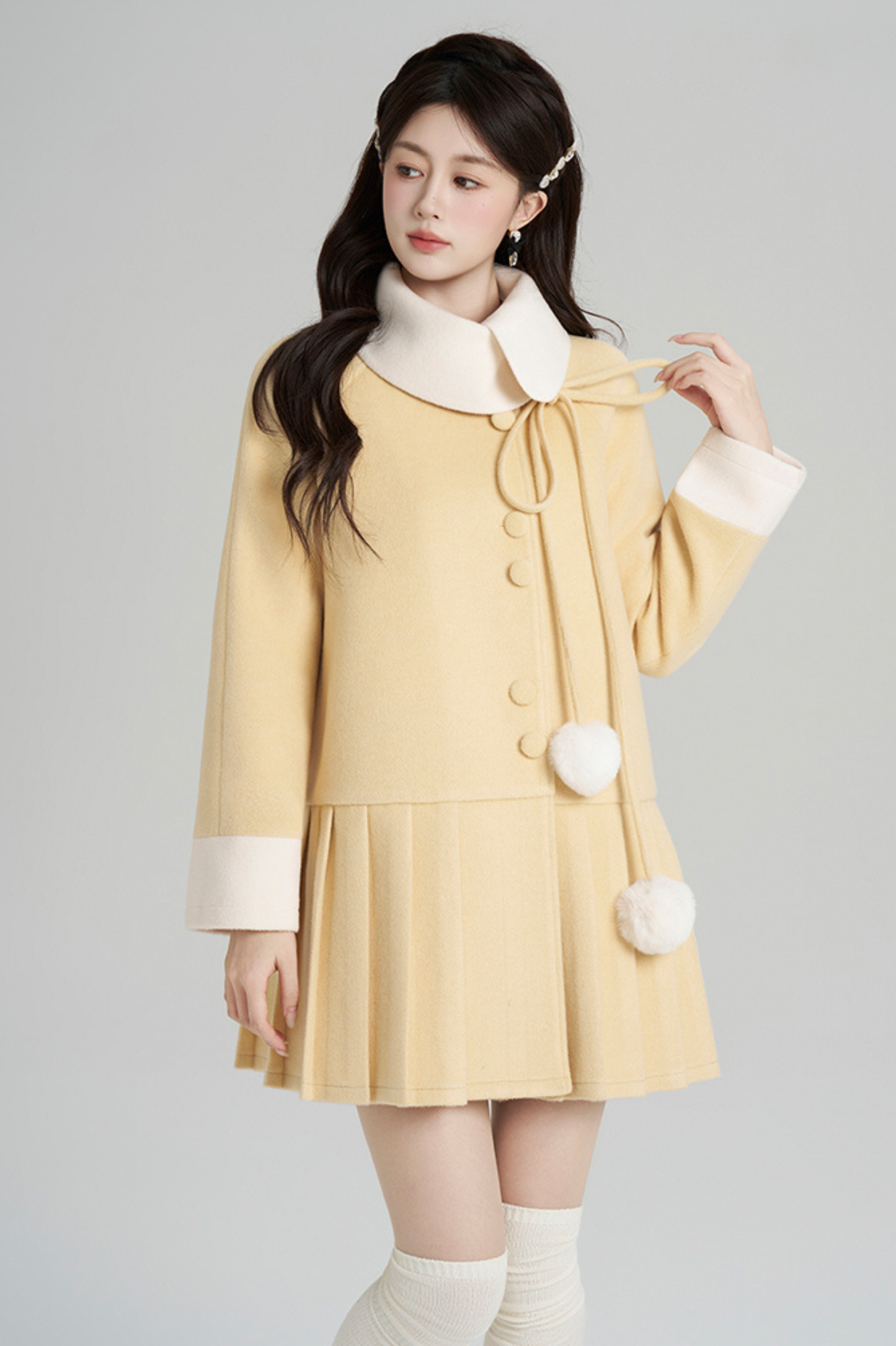 イエロープリーツウールコート