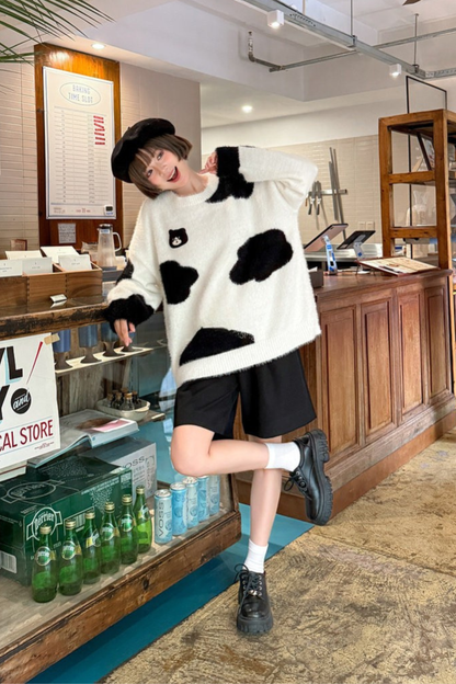 モノクロルーズニットセーター