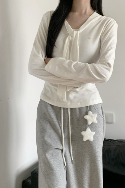 マルチカラーボタンリボントップス