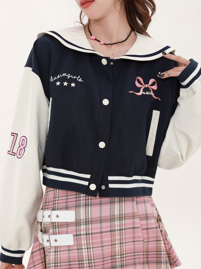 Navy-colored short stadium jacket + checked skirt