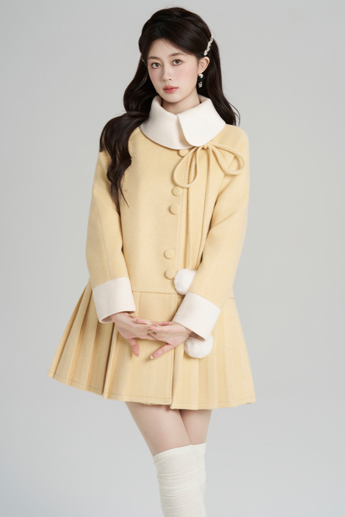 イエロープリーツウールコート