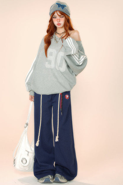 Over -size slant shoulder sweatshirt