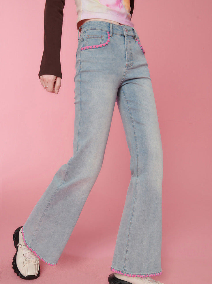 Contrast color stitch flared denim