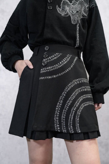 Pleated skirt with asymmetrical design