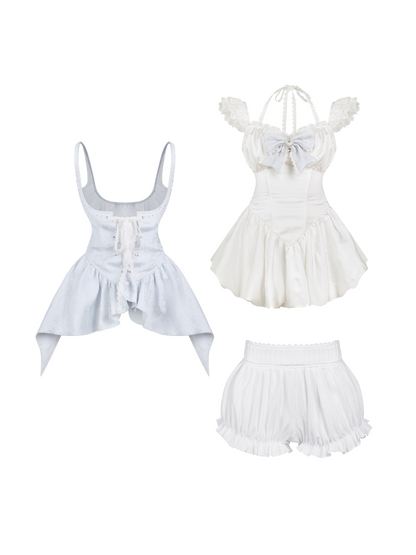 Vestido blanco con lazo + Chaleco jacquard azul + Pantalones cortos blancos