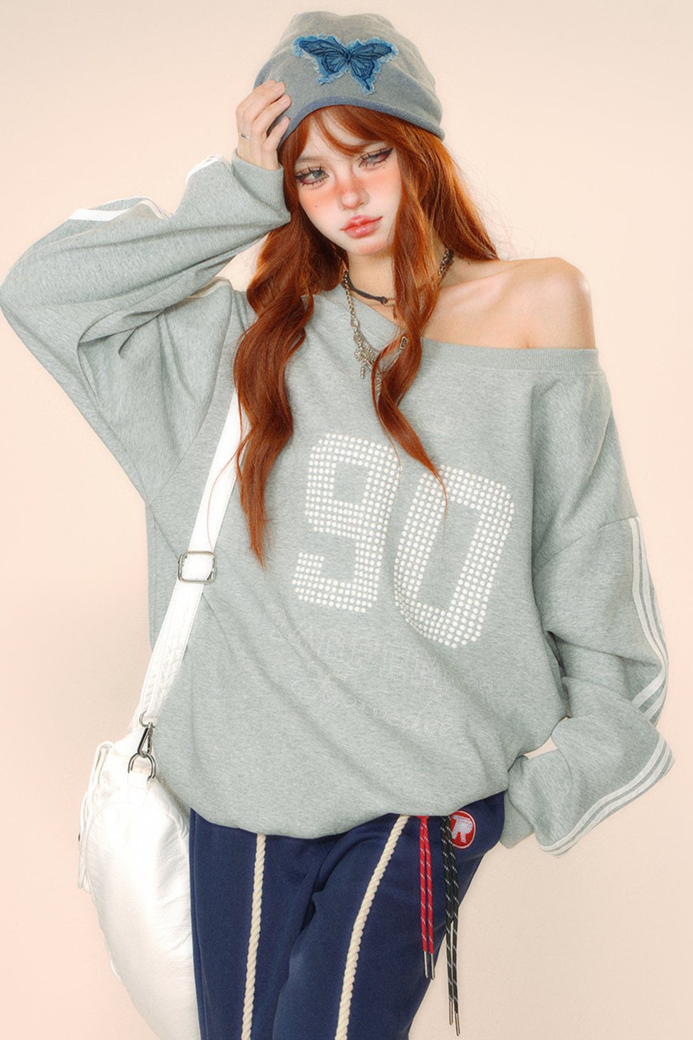 Over -size slant shoulder sweatshirt