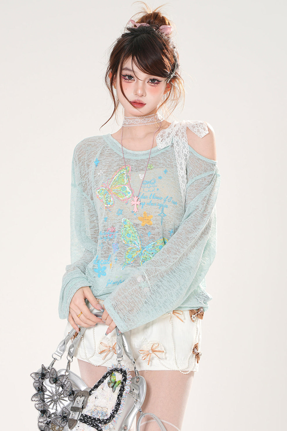 フロスティングバタフライスモックトップス