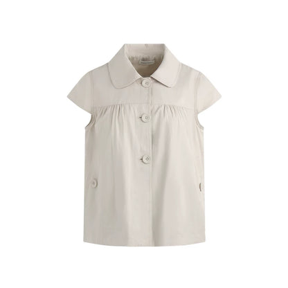 Top con colletto da bambola e maniche a volant