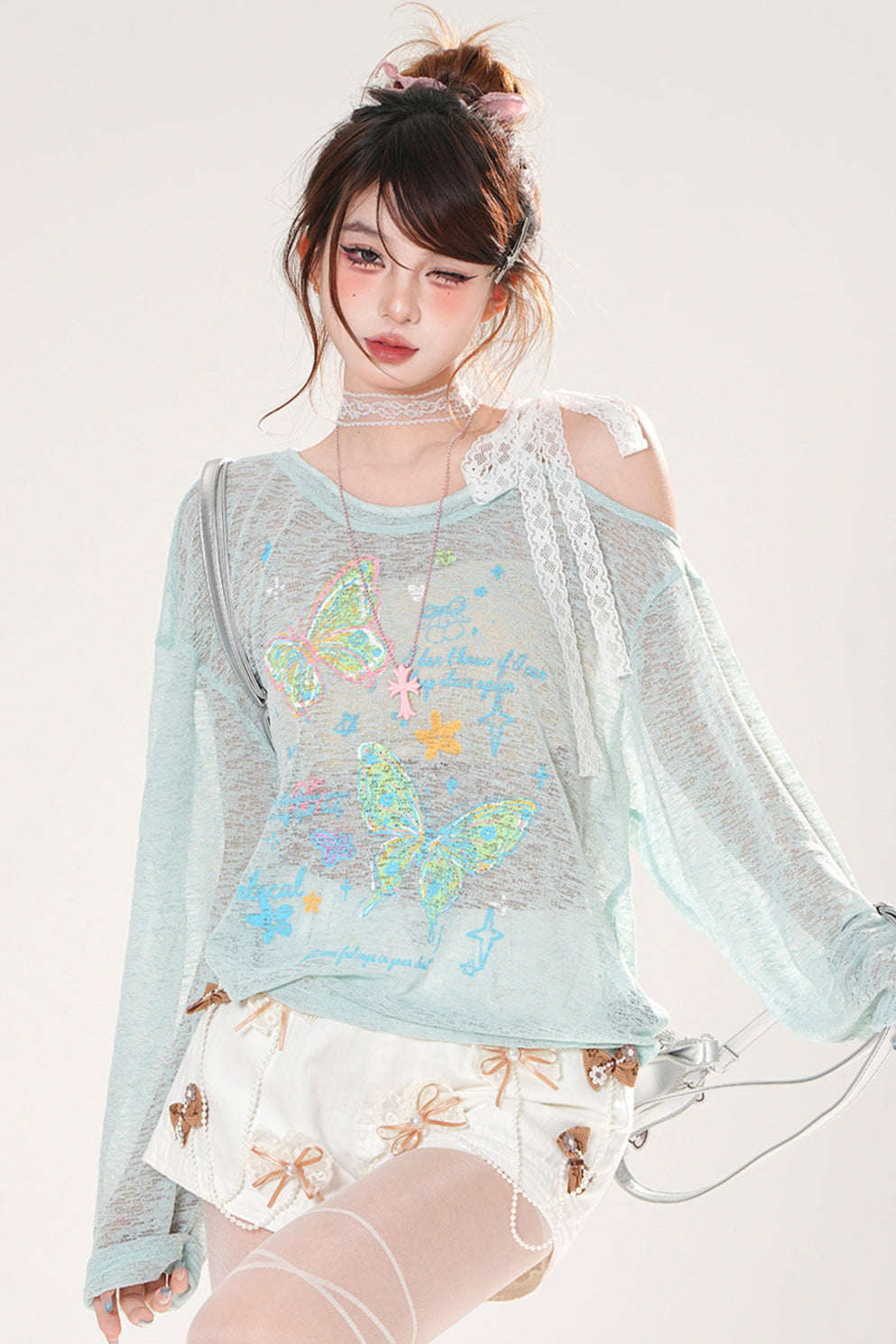 フロスティングバタフライスモックトップス