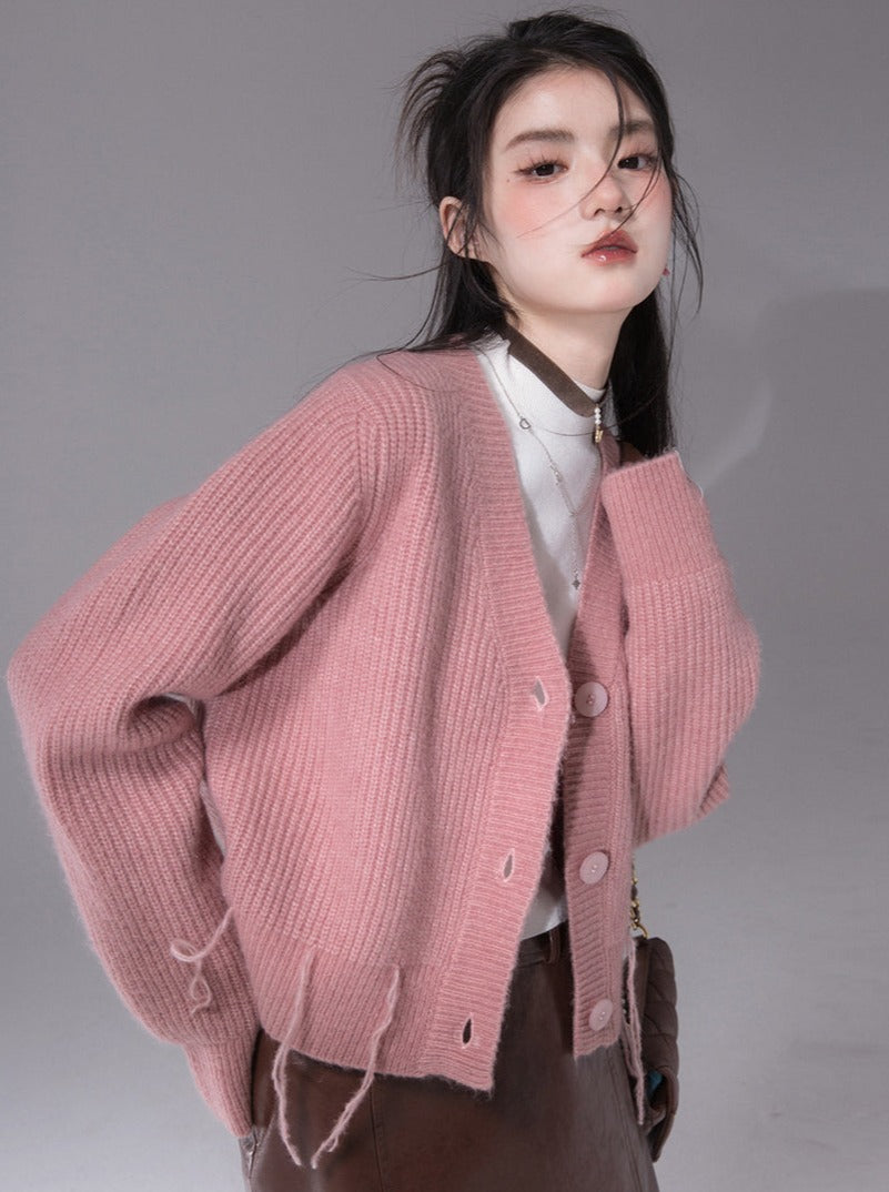 Very pastel-colored wool cardigan