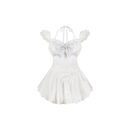 Vestido blanco con lazo + Chaleco jacquard azul + Pantalones cortos blancos