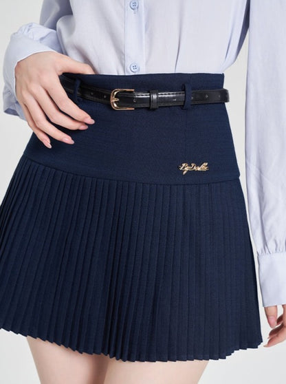 Navy-colored blue shirt + pleated skirt