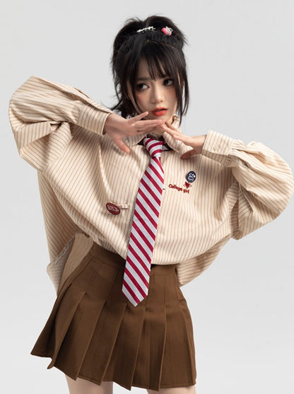 Striped tie shirt + pleated skirt