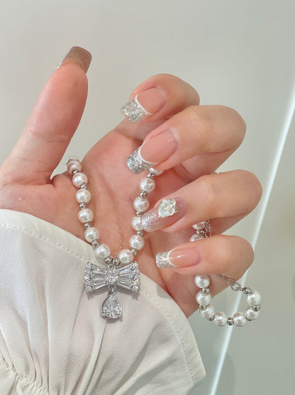 Sparkling zircon ribbon pearl necklace