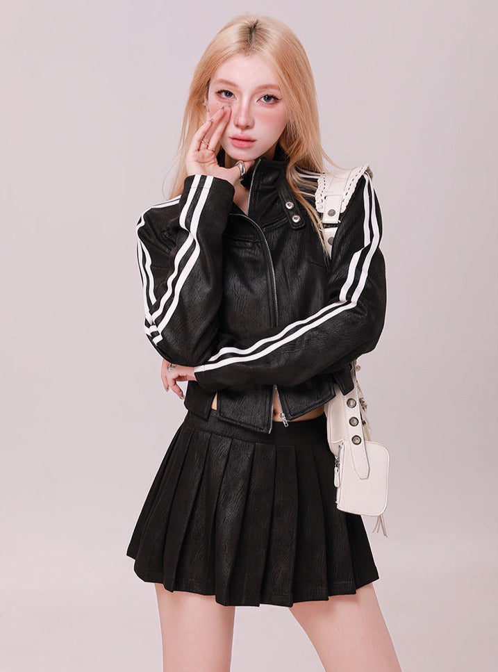 Line leather jacket + pleated skirt