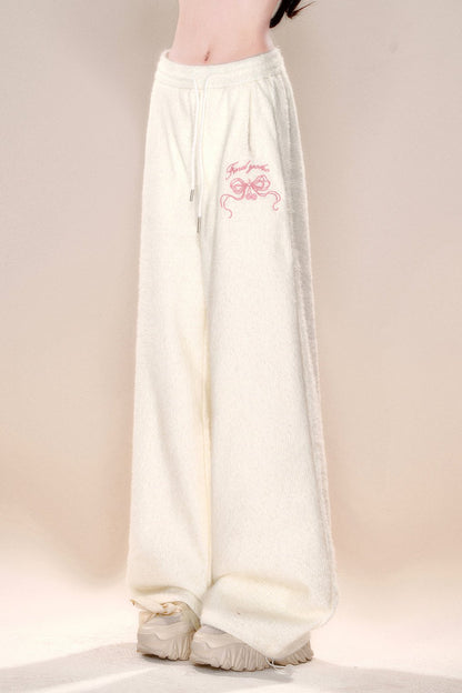 プラスフリースルーズコットンパンツ