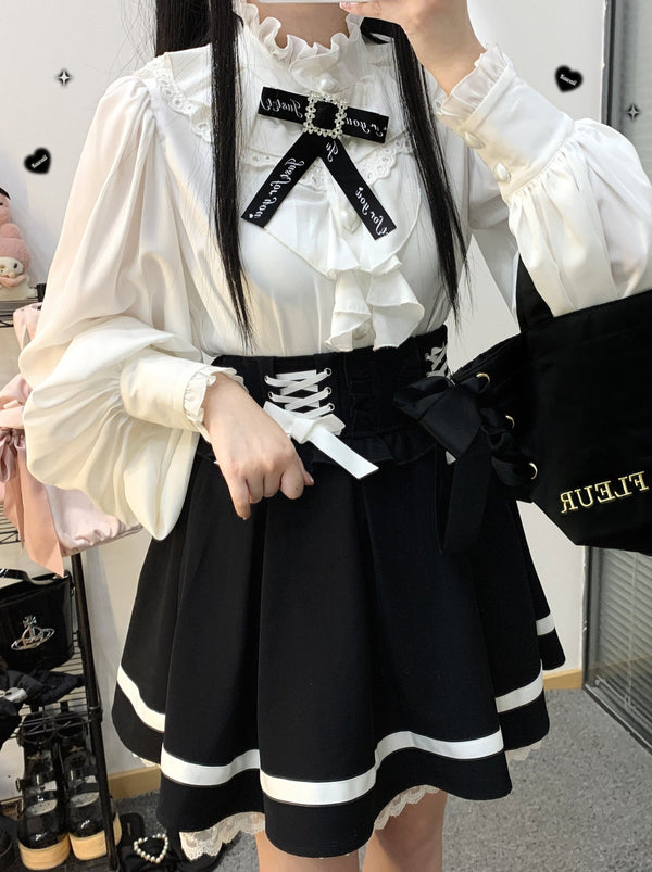 Stand collar loose ruffle volume sleeve ribbon shirt [Reserved Item].