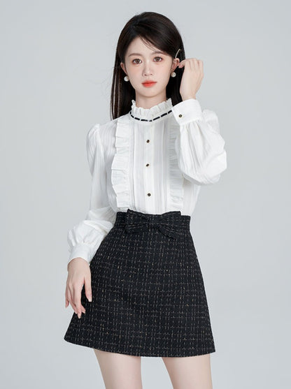 Tweed vest + tweed skirt + ruffle collar blouse