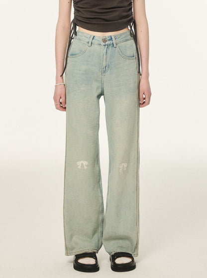 Pointed ribbon design loose denim pants