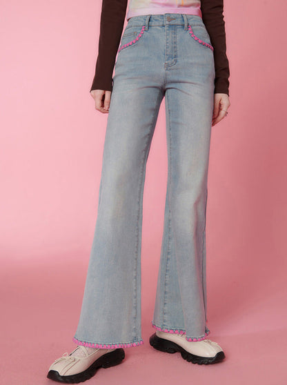 Contrast color stitch flared denim