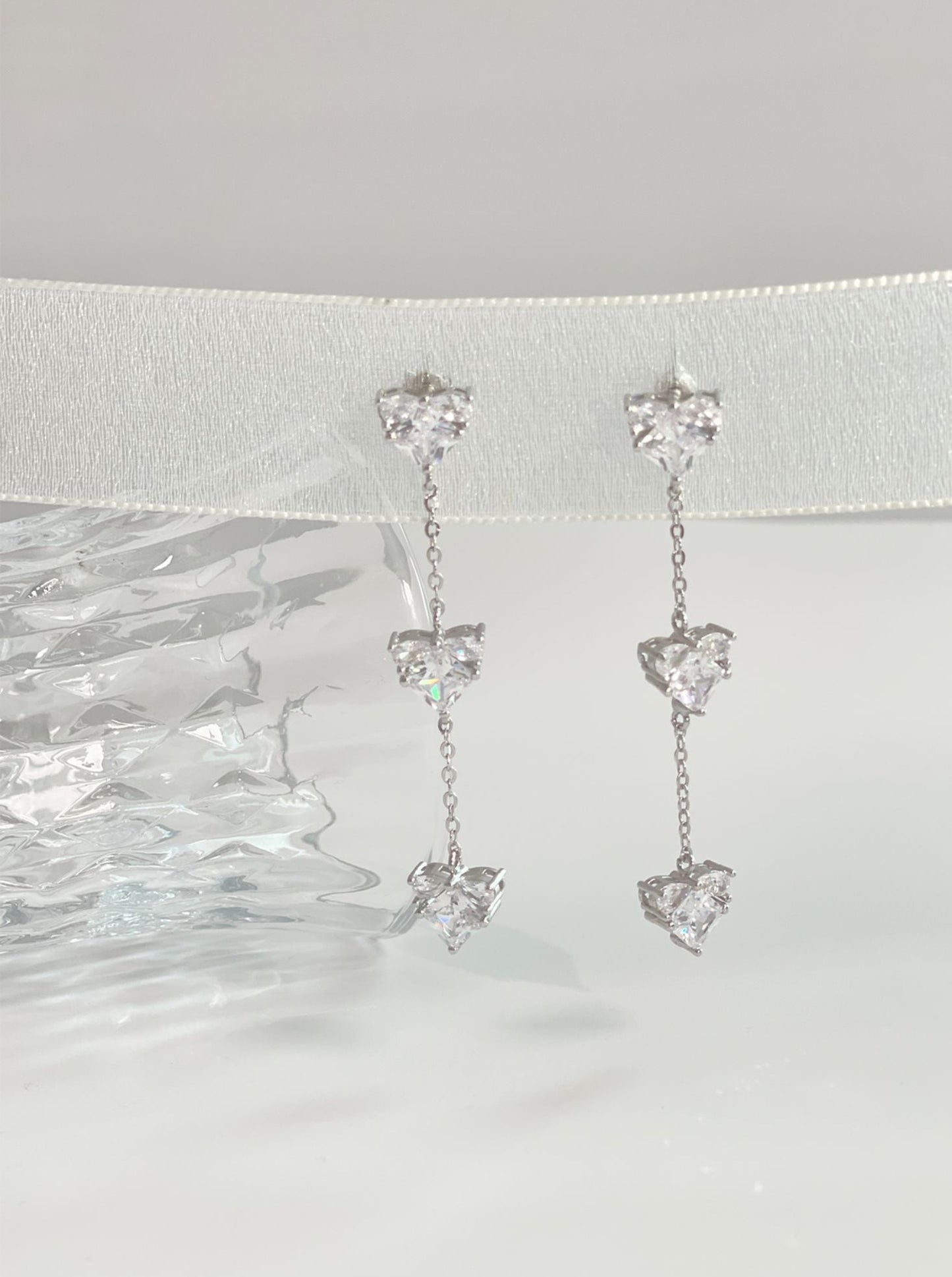 Boucles d'oreilles en cristal triple coeur