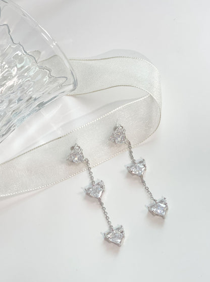 Boucles d'oreilles en cristal triple coeur