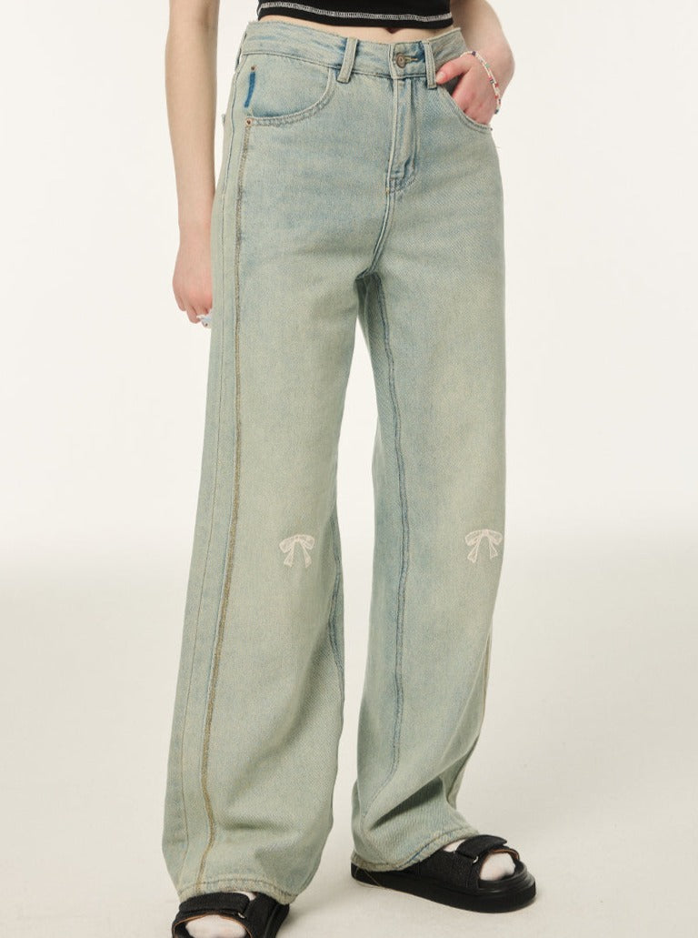 Pointed ribbon design loose denim pants