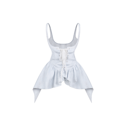 Vestido blanco con lazo + Chaleco jacquard azul + Pantalones cortos blancos