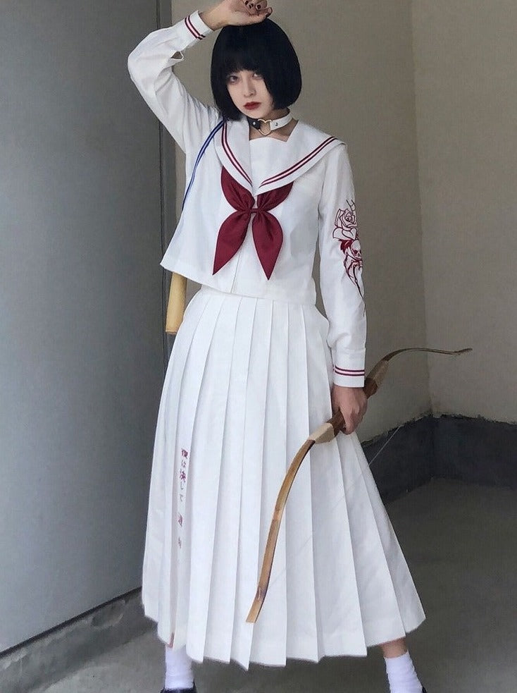 Embroidered sailor shirt + long pleated skirt