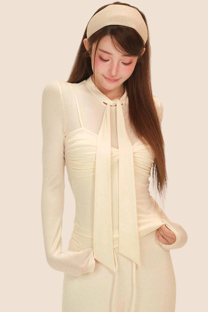 クラウドライクトゥイストカラートップス