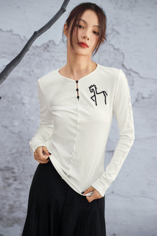 Top manches longues ajusté blanc avec broderie