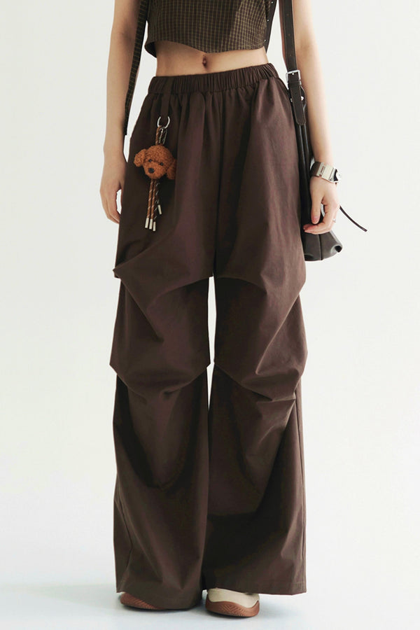 Pantalones elegantes anchos plisados