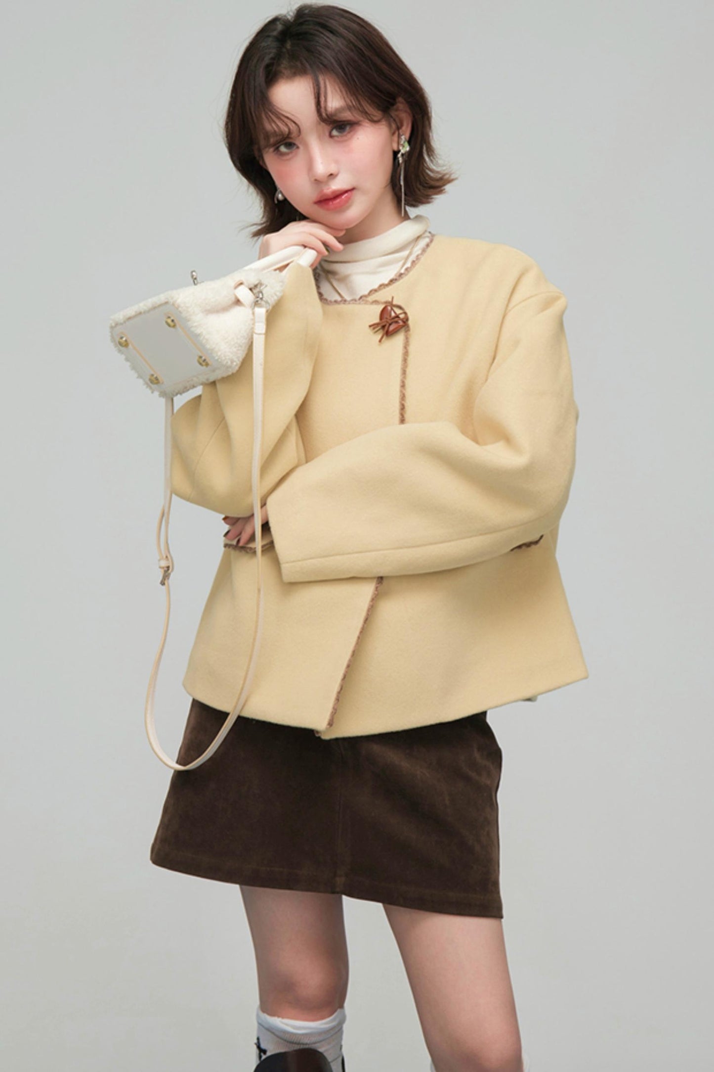 アシンメトリカルレースウールコート