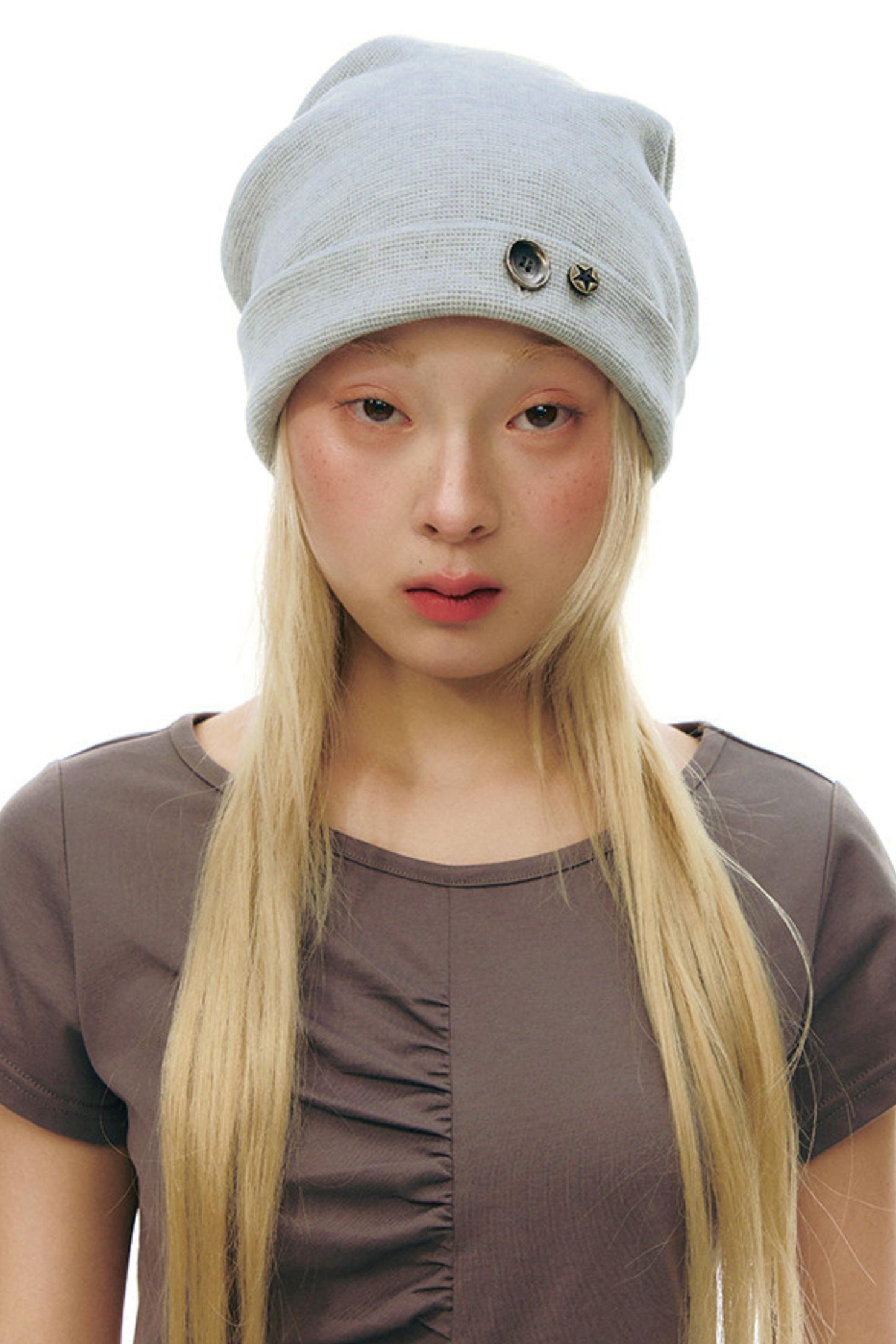 Bonnet à boutons en tricot gaufré