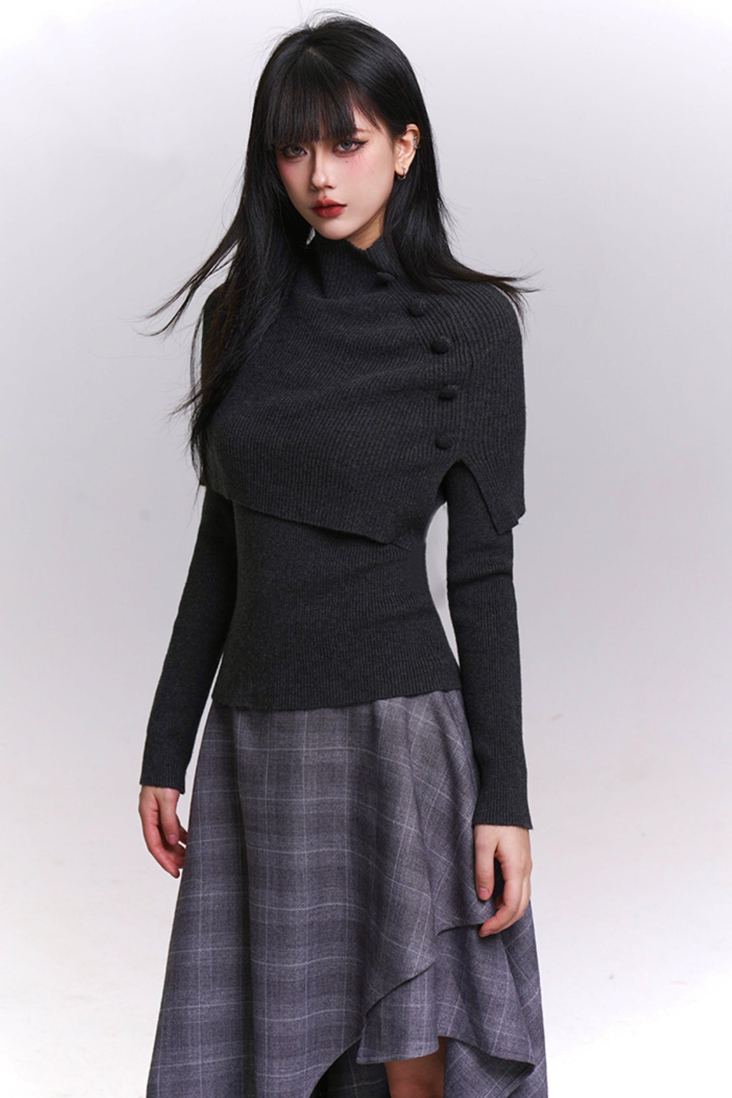 アトモスフェリックケープデザインニットトップ