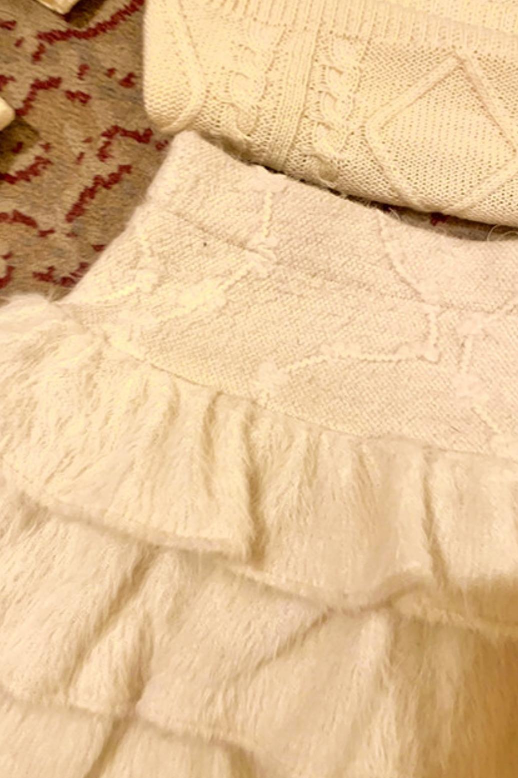 Soft twisted knit sweater + tutu skirt + sleeve knit