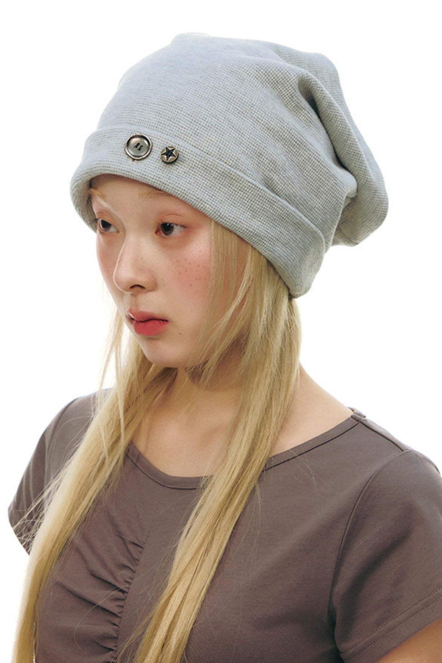 Bonnet à boutons en tricot gaufré