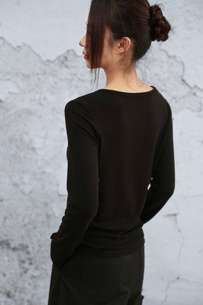 クリスタルボタンベルベットニットトップス