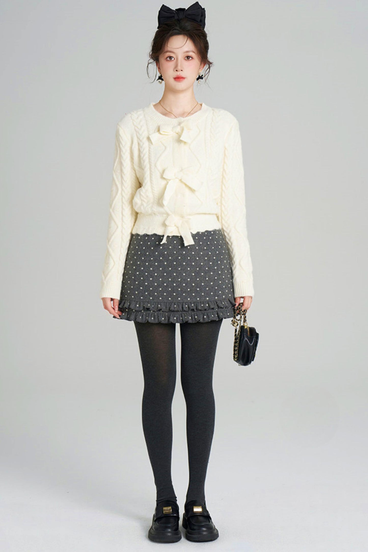 リボンケーブルニットカーディガン