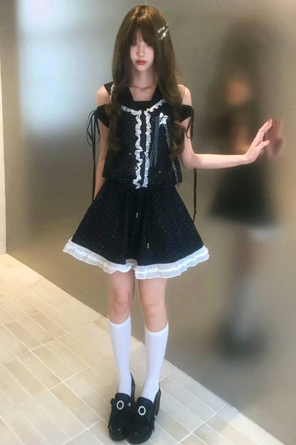 Vestido de hombros descubiertos con estrellas negras + top