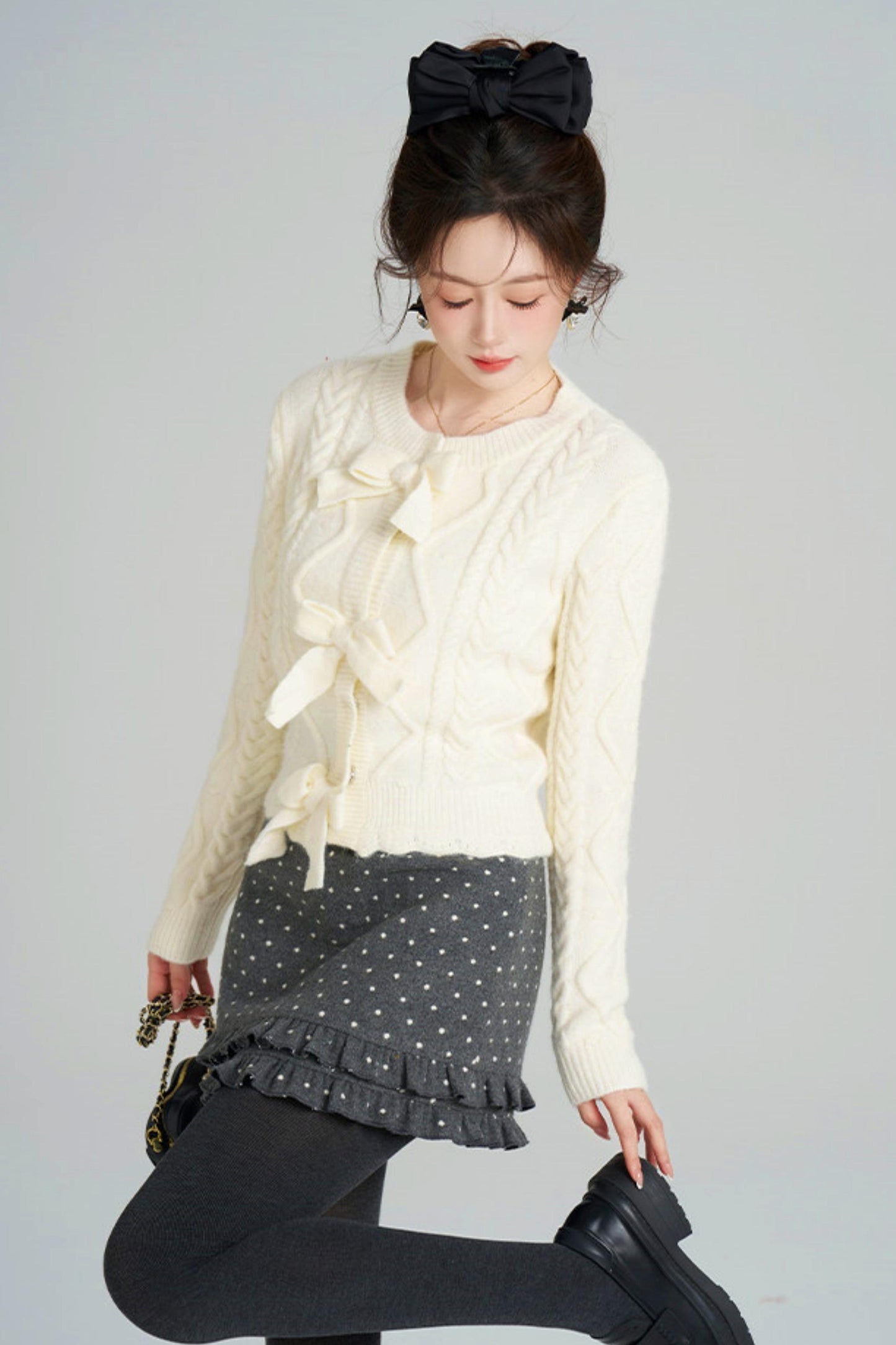 リボンケーブルニットカーディガン