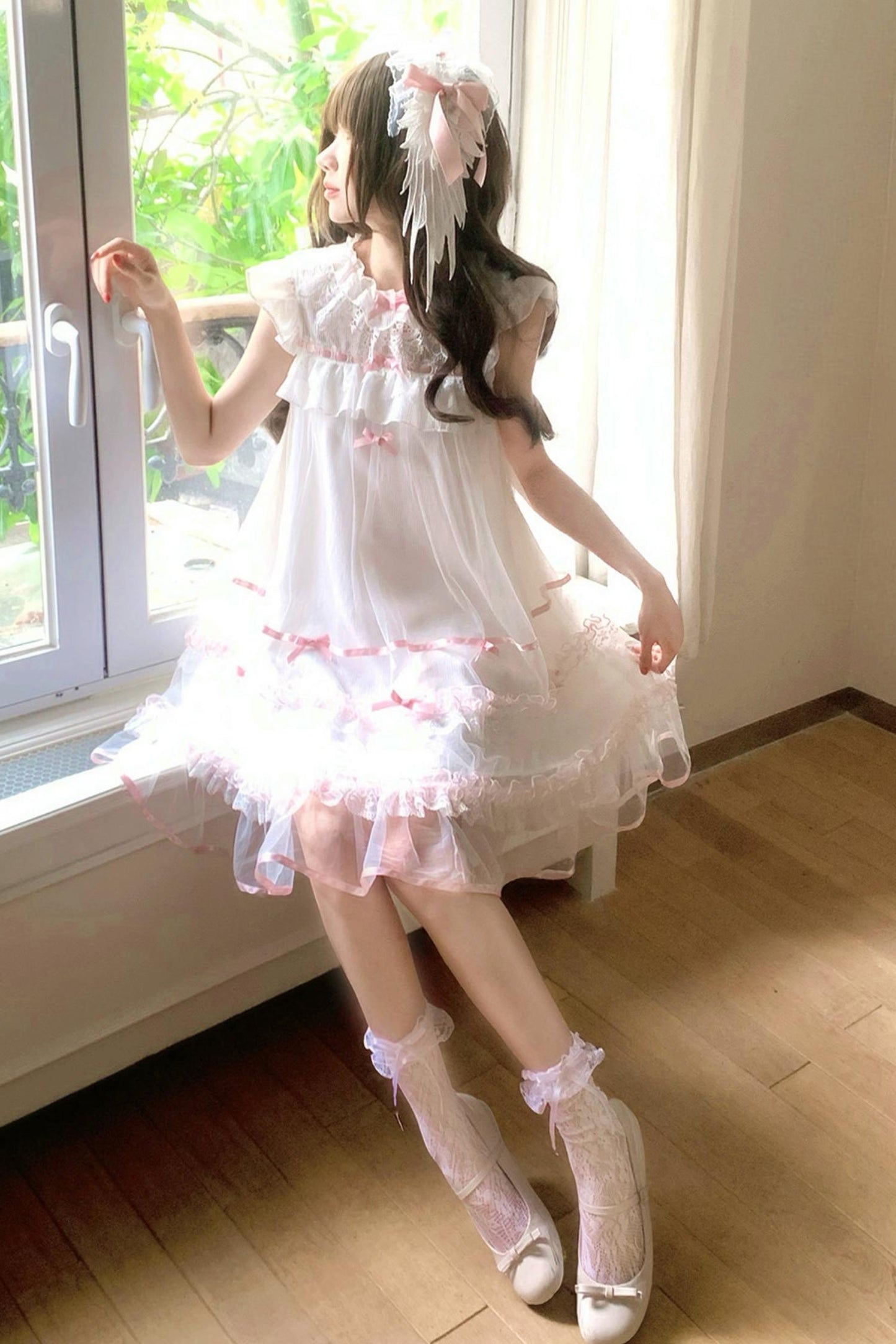 Vestido de tul con volante de ángel