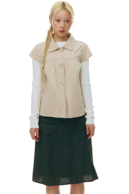 Top con colletto da bambola e maniche a volant