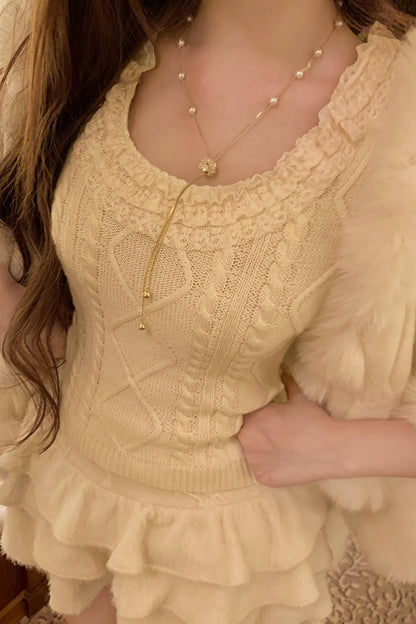 Soft twisted knit sweater + tutu skirt + sleeve knit