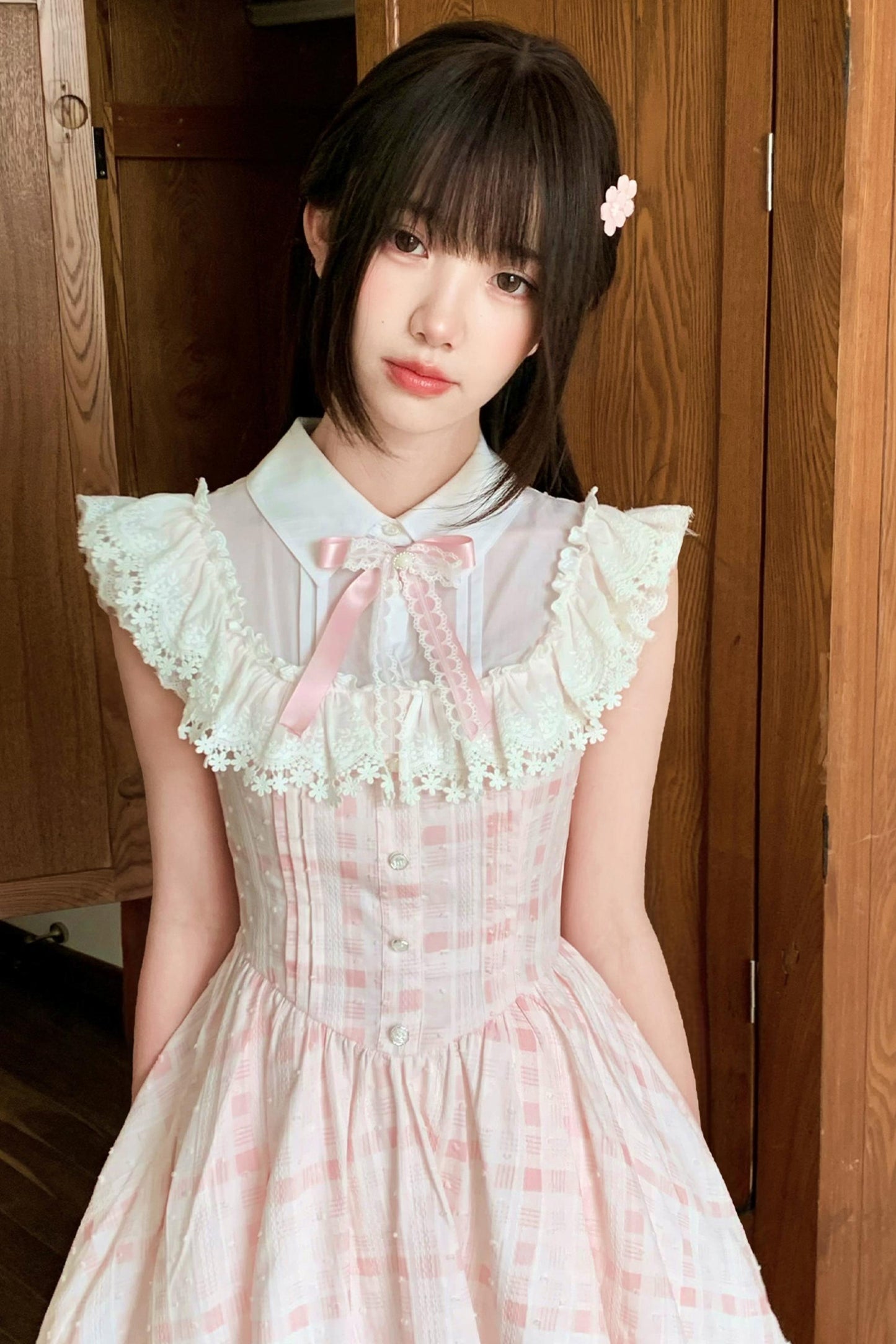 Rosa kariertes Puppenkleid