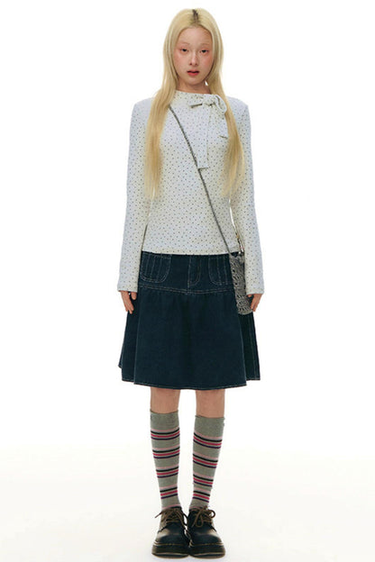 Top aderente con collo alto a stella