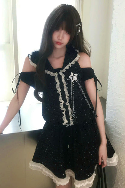 Vestido de hombros descubiertos con estrellas negras + top