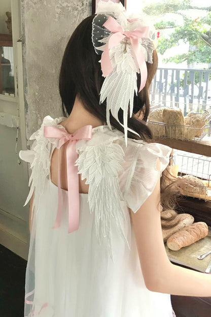 Vestido de tul con volante de ángel